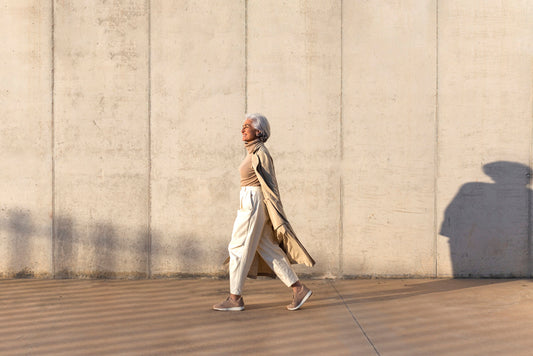 Woman walking smiling and happy