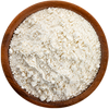Powdered Pharma Gaba in a wooden bowl on a white background