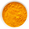 Vibrant orange turmeric in a wooden bowl on a white background 